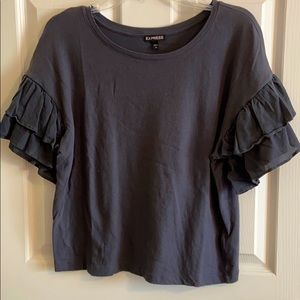 Express blouse with ruffled sleeves.